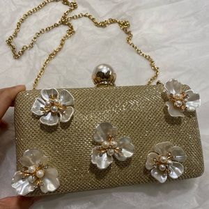 Gold clutch with 3D flowers